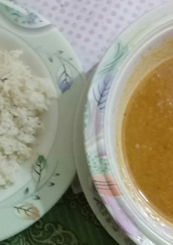 A picture of Moong dal with boiled rice.
