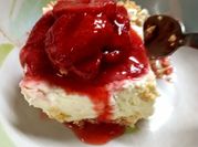 Una foto de cheesecake con leche condensada