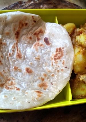 A picture of Lunch box paratha and milky dum aloo.