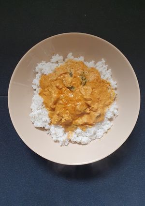 A picture of Butter Chicken Coriander and Rice.