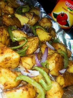 A picture of Herby Oven Roasted Potatoes #themechallenge #potatoes.