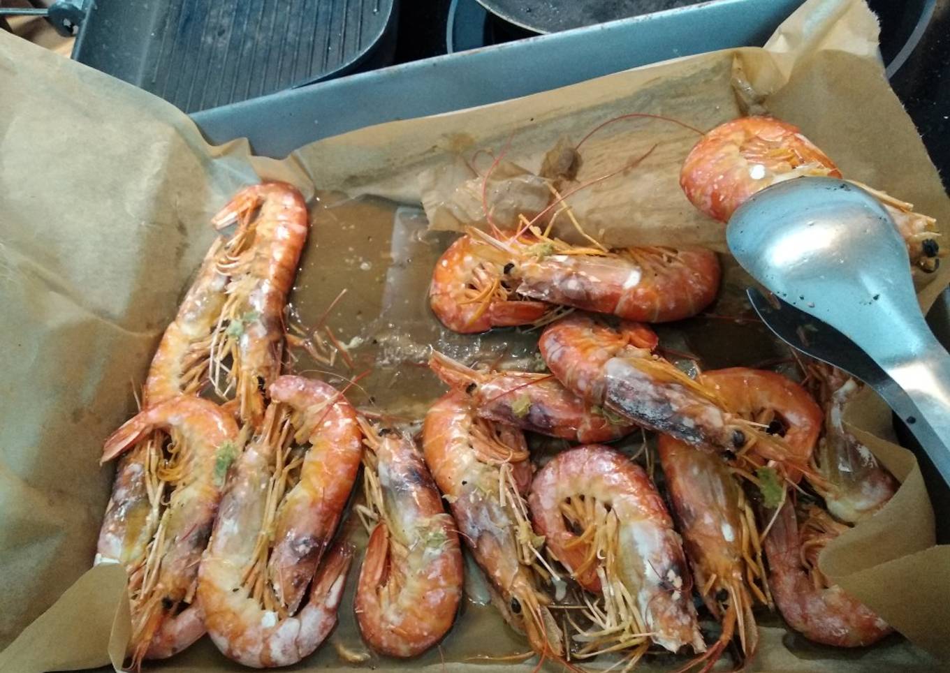 Gambones al horno con ajo y whisky