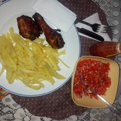 Soy sauce baked chicken,potato fries + kachumbari A picture of Soy sauce baked chicken,potato fries + kachumbari.