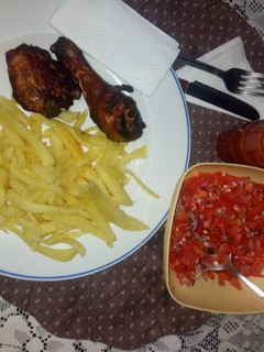 A picture of Soy sauce baked chicken,potato fries + kachumbari.