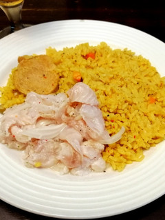 Una foto de Arroz de Chuletas, Solomillo de Cerdo y Ceviche de Lenguado