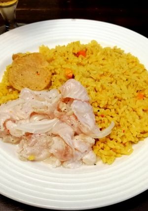 Una foto de Arroz de Chuletas, Solomillo de Cerdo y Ceviche de Lenguado