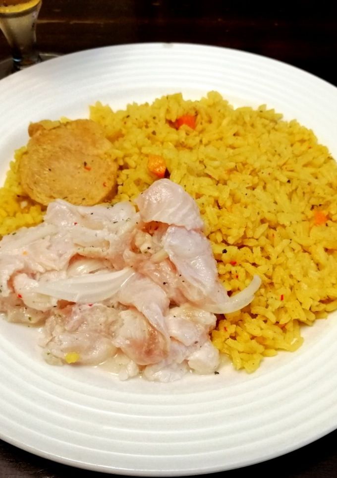 Una foto de Arroz de Chuletas, Solomillo de Cerdo y Ceviche de Lenguado