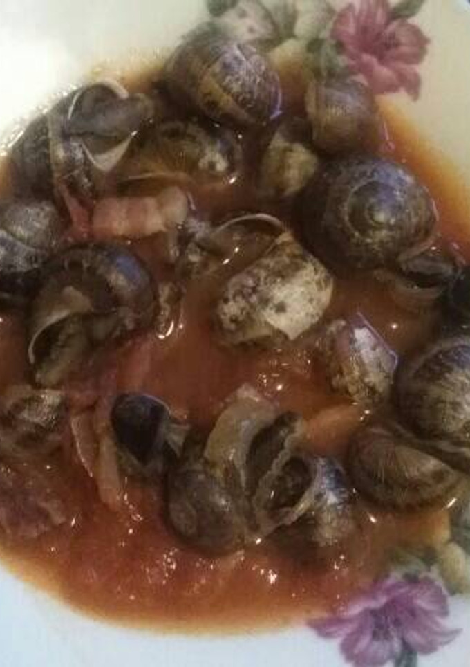 Una foto de Caracoles en su salsa