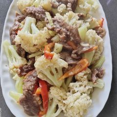 A picture of Sautéed Cauliflower with Beef.