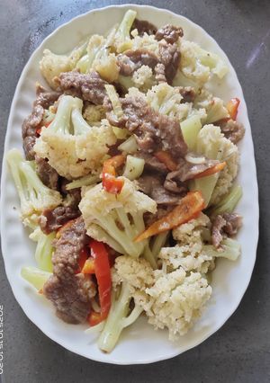 A picture of Sautéed Cauliflower with Beef.