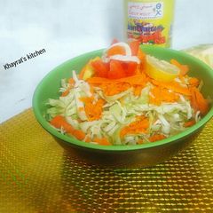 A picture of Cabbage and carrots salad.