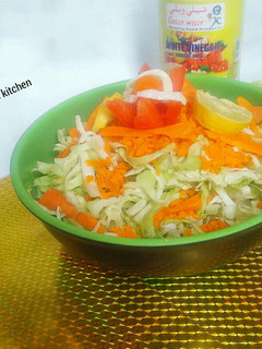 A picture of Cabbage and carrots salad.