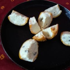 A picture of Orange wedges icecream.
