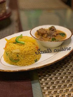 A picture of Turmeric rice and beef curry.