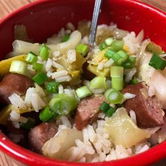 A picture of Smoked sausage and squash rice bowl.