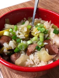 A picture of Smoked sausage and squash rice bowl.