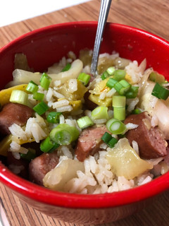 A picture of Smoked sausage and squash rice bowl.