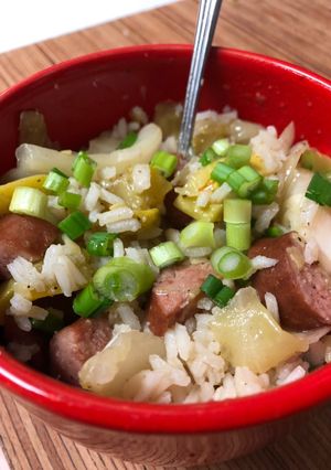 A picture of Smoked sausage and squash rice bowl.