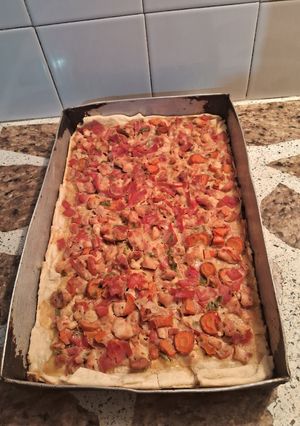 A picture of Crispy Chicken Tart with Ham, Cheese, and Carrots.