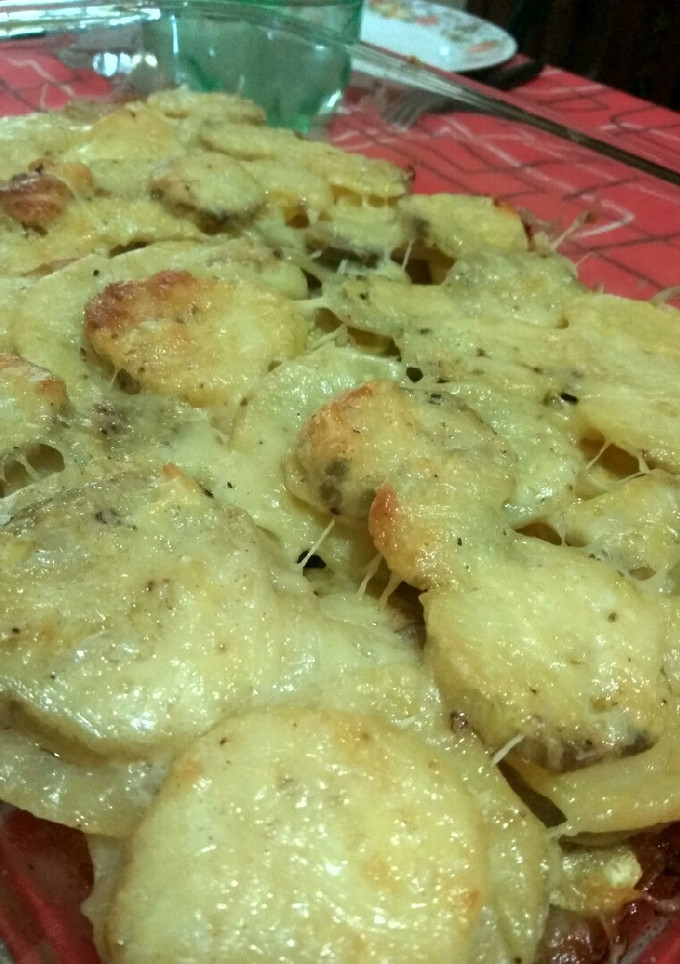 Una foto de Papas y batatas con crema