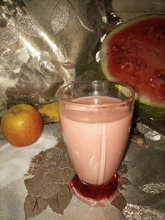 A picture of Water melon, banana and apple smoothie.
