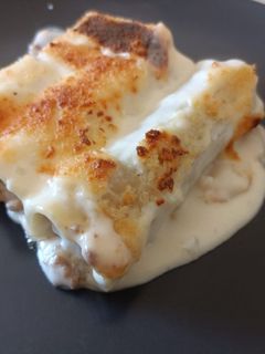 Una foto de Canelones de carne