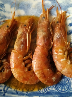 Una foto de Gambones al horno con vino blanco
