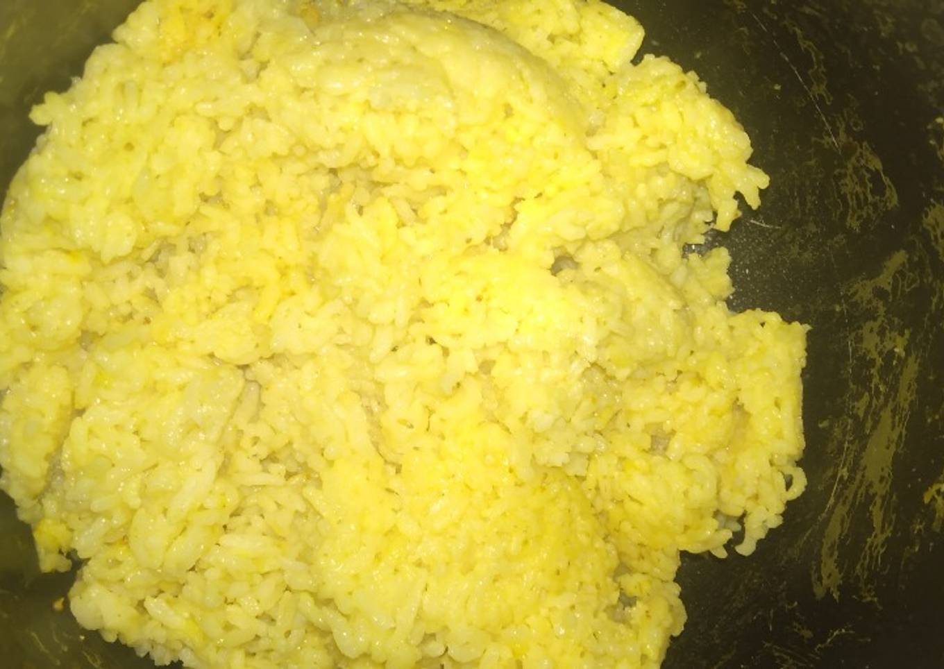 Nasi kuning bumbu racik ikan goreng