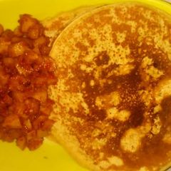A picture of Pancakes with sauce.