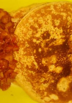 A picture of Pancakes with sauce.