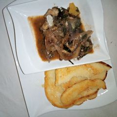 A picture of Semolina pancake with fish peppersoup.