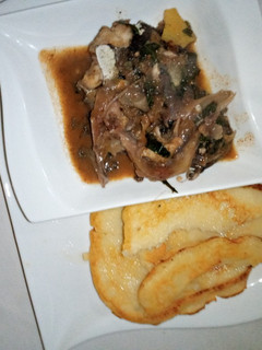 A picture of Semolina pancake with fish peppersoup.