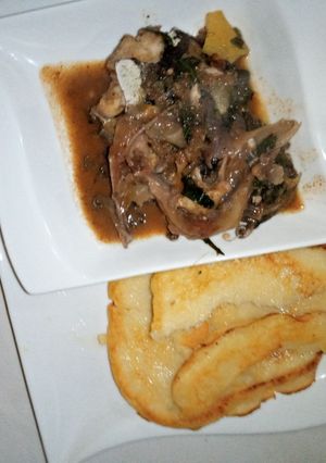A picture of Semolina pancake with fish peppersoup.