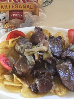 Una foto de Solomillo de cerdo con ajetes