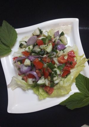 A picture of Italian rustic cucumber and tomato salad.