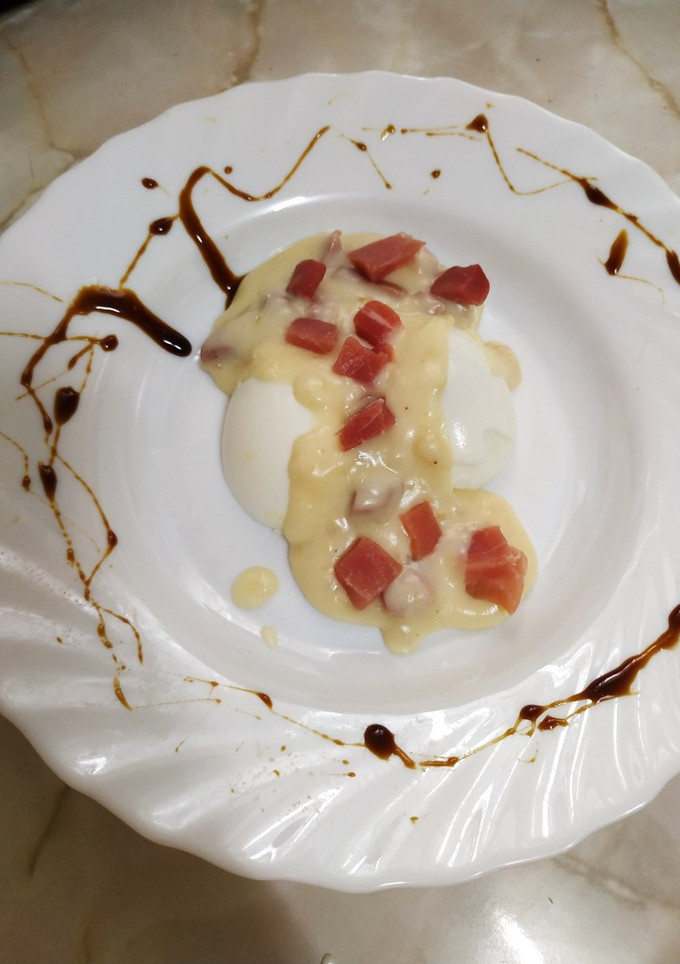 Una foto de Huevos con bechamel