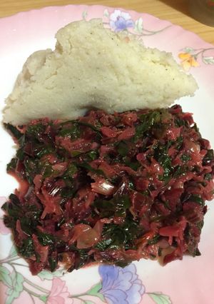 A picture of Beet spinach served with ugali.