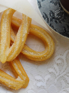 Una foto de Churros con chocolate