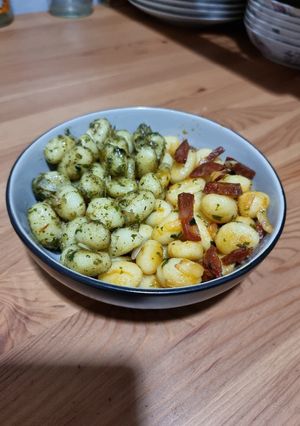 A picture of Gnocchi with Pesto and Chorizo.