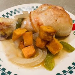 A picture of Baked Chicken Legs with Sweet Potatoes.