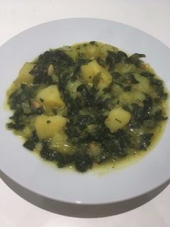 Una foto de Patatas con espinacas