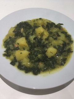 Una foto de Patatas con espinacas