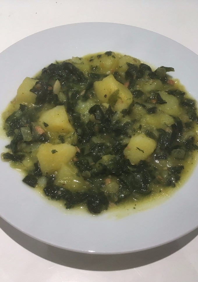 Una foto de Patatas con espinacas