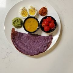A picture of Violet cabbage millet dosa.