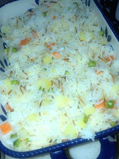 صورة لوصفة دجاج محشي مع رز بخضار