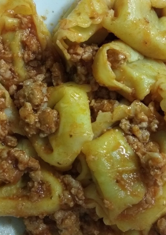 Una foto de Pasta rellena de calabaza con carne picada