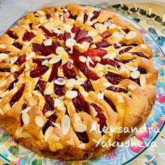 Plum pie with almonds and dried cranberries A picture of Plum pie with almonds and dried cranberries.