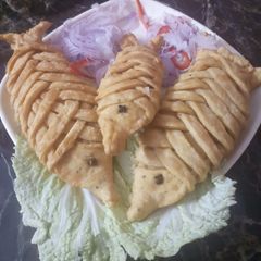 A picture of Stuffed pleated fish.