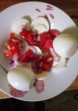 A picture of Boiled eggs with kachumbari #4 weeks challenge#authormarathon.
