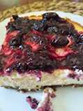 Cheesecake con coulis de arándanos